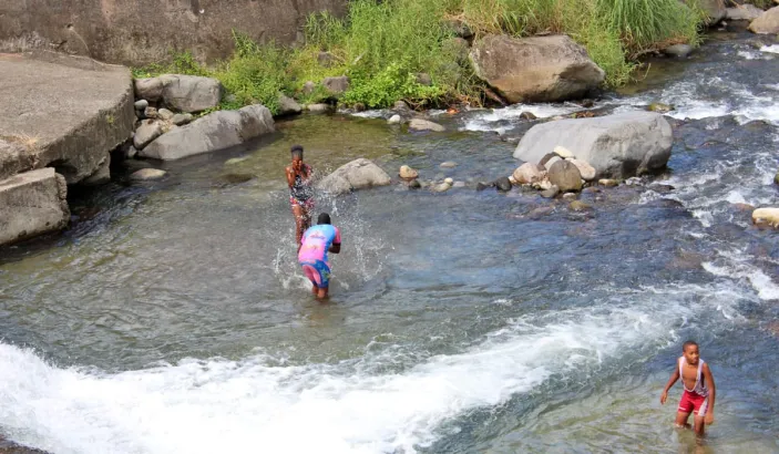 People swimming in the Grande Rivière